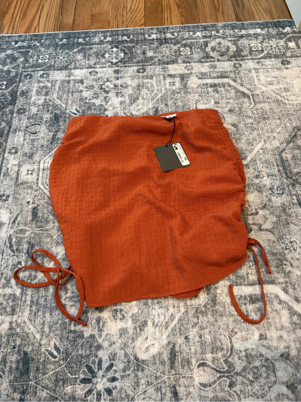 Le Lis Orange Textured Mini Skirt with Side Ties